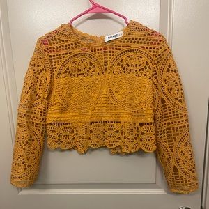 Super cute crochet crop long sleeve too. Mustard yellow in a size medium